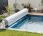 Preview: GFK-Pool ROMAINE 920x370x160 cm mit Oberflurrollladen